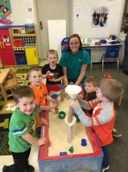 Students working with sensory play