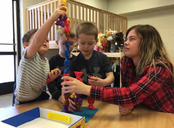 Student building block tower