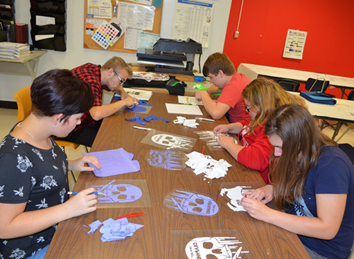 Students working at vinyl station